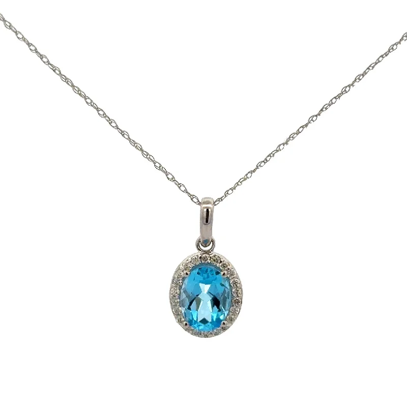 Blue Topaz and Diamond Pendant in White Gold