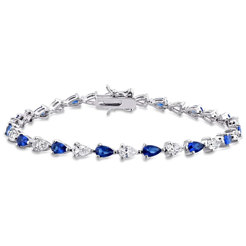 10 1/2 CT TGW Pear Shape Created Blue and White Sapphire Tennis Bracelet in Sterling Silver